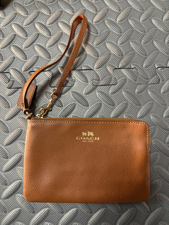 Coach Handbags - Coach Leather Wristlet with Gold Logo